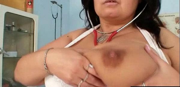 Huge tits Milf nurse shows off her big mellons